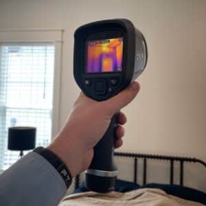 Home Inspector Using FLIR Camera during a Home Inspection